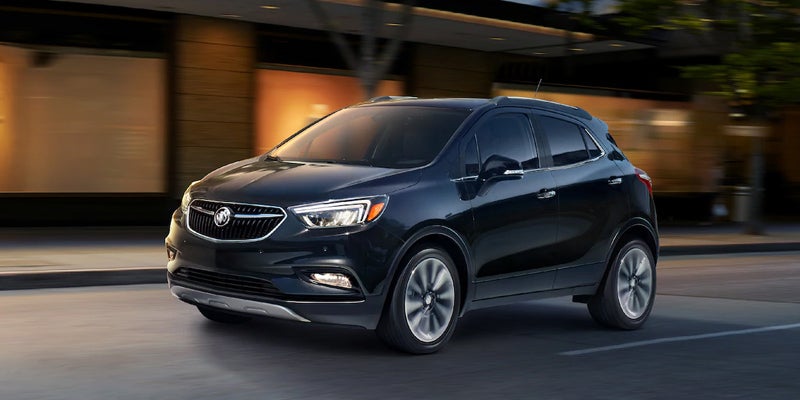 black BUICK ENCORE on the road