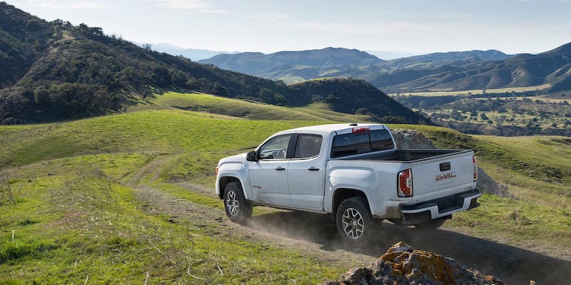 2021 GMC CANYON in a mountain road
