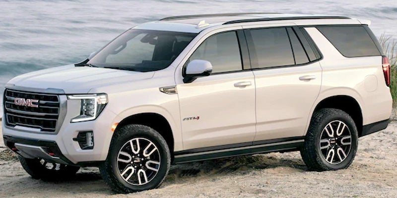 white GMC Yukon XL sideview